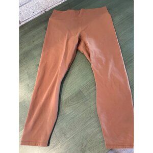 Fabletics PowerHold High-Rise Tan Leggings With Back Lattice Detail Wome